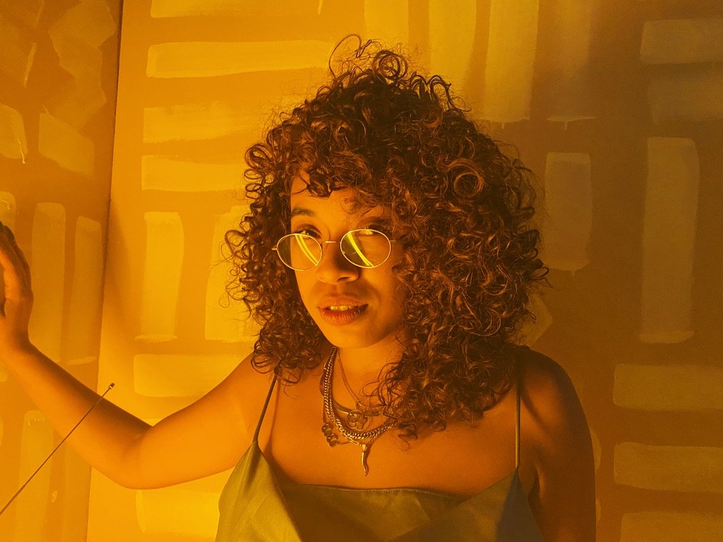 Myeka, aka Lady CoCo, in warm golden light