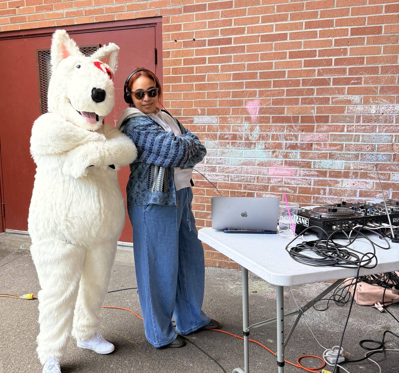 Lady CoCo posing back-to-back with Target's mascot